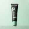 Крем Skinormil Anti-Acne Skin Balance Cream в черном тюбике с мятно-зеленой крышкой на нежно-зеленом фоне.